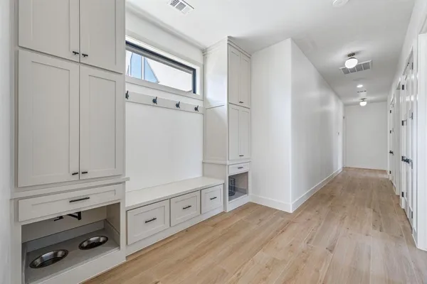 a view of a livingroom with wooden floor
