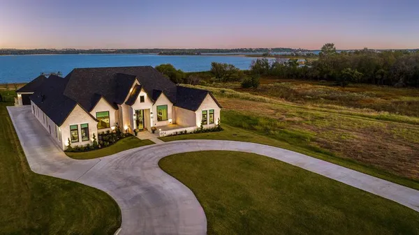 a view of a swimming pool with an ocean view