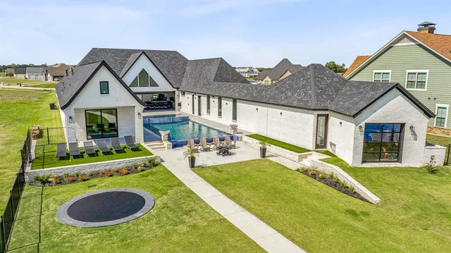 a view of house with yard entertaining space