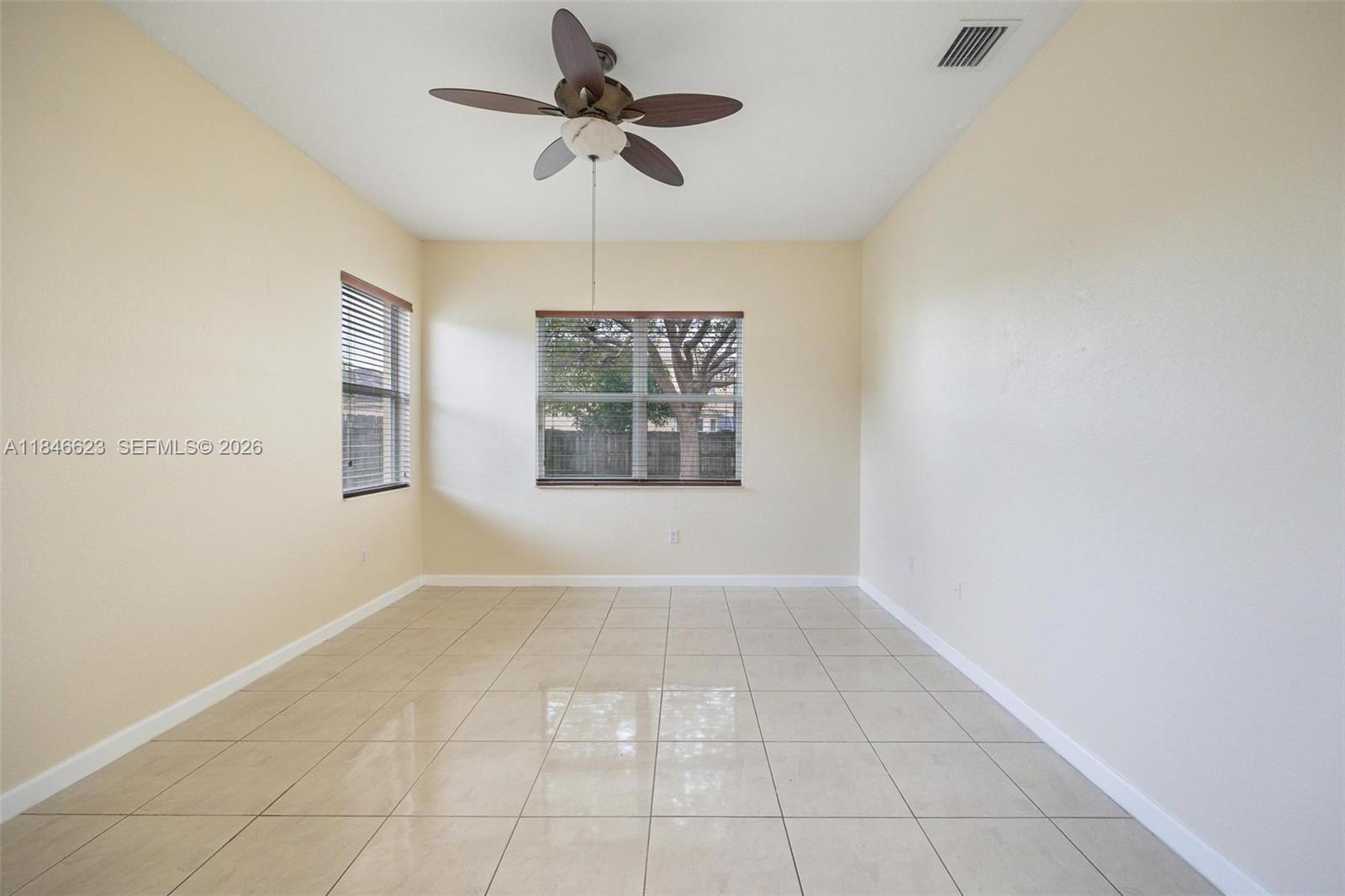 1780 Southeast 19th Terrace Homestead, FL 33035 - Photo 40 of 70 a view of an empty room with a window