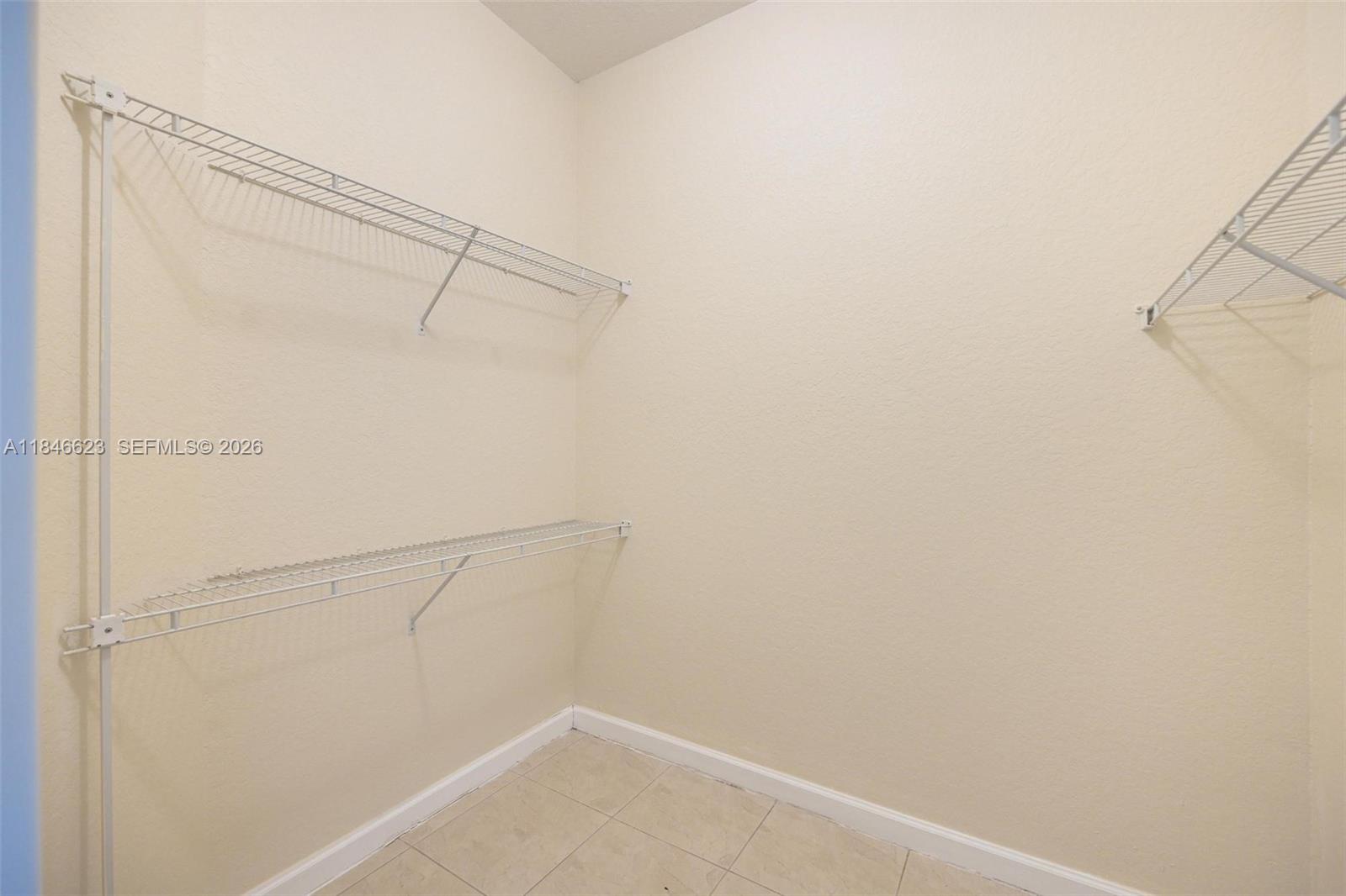 1780 Southeast 19th Terrace Homestead, FL 33035 - Photo 41 of 70 a view of small space with racks on the wall