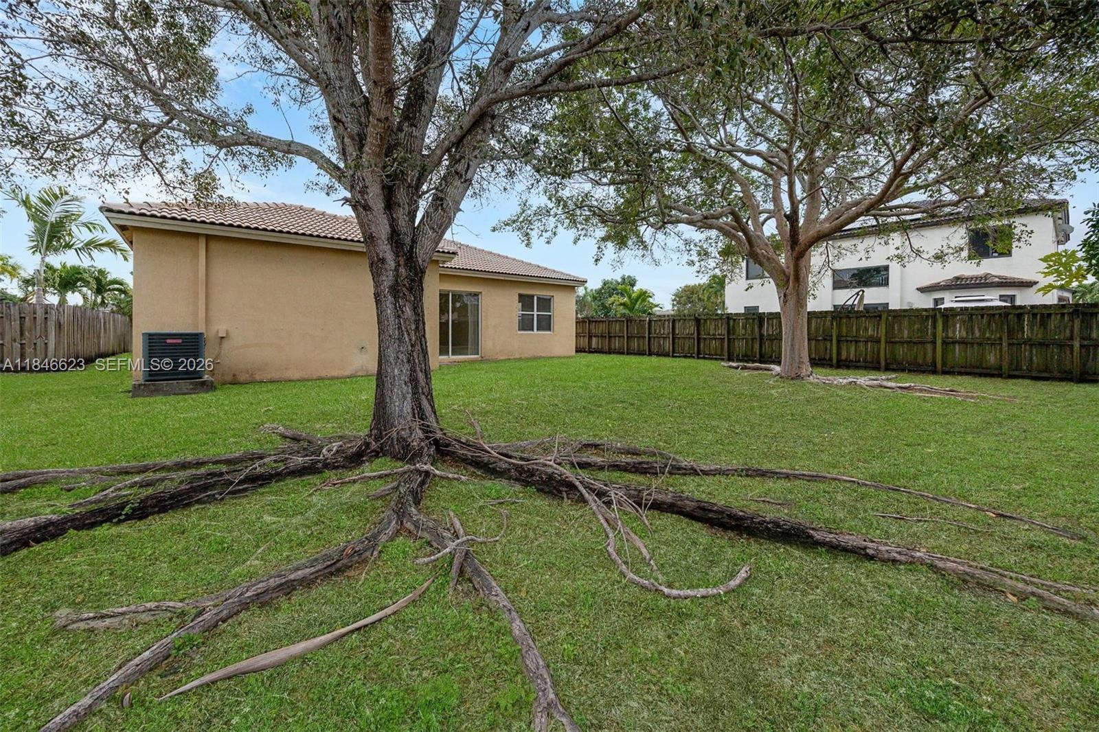 1780 Southeast 19th Terrace Homestead, FL 33035 - Photo 49 of 70 a backyard of a house with barbeque oven