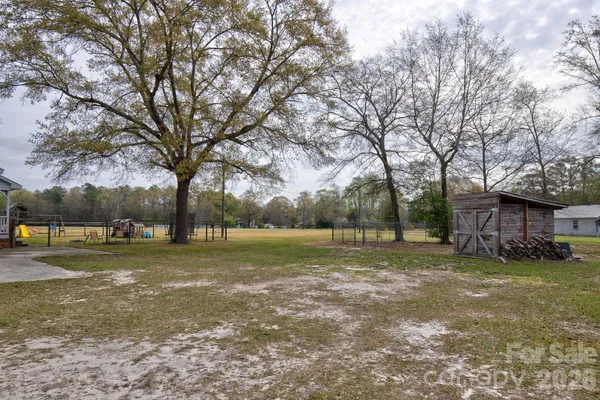 a view of a yard in front of a house