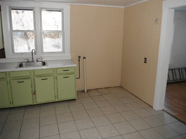 87 Lowell Road Pepperell, MA 01463 - Photo 4 of 15 a utility room with a window dryer and washer