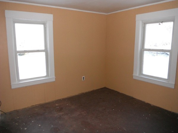 87 Lowell Road Pepperell, MA 01463 - Photo 6 of 15 an empty room with a window