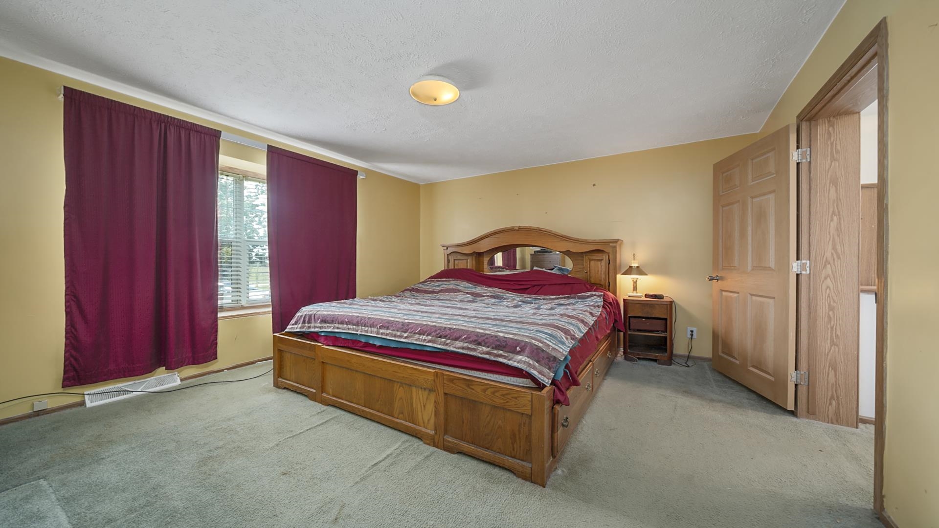 820 Brooklyn Road West Brooklyn, IL 61378 - Photo 30 of 41 a bedroom with a bed and a closet