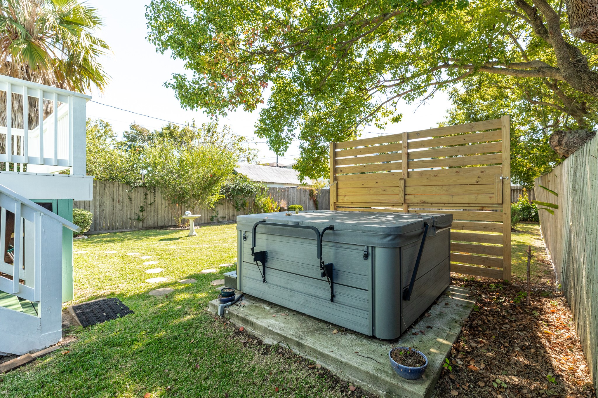 4317 Avenue R Galveston, TX 77550 - Photo 11 of 27 a view of a backyard with chairs