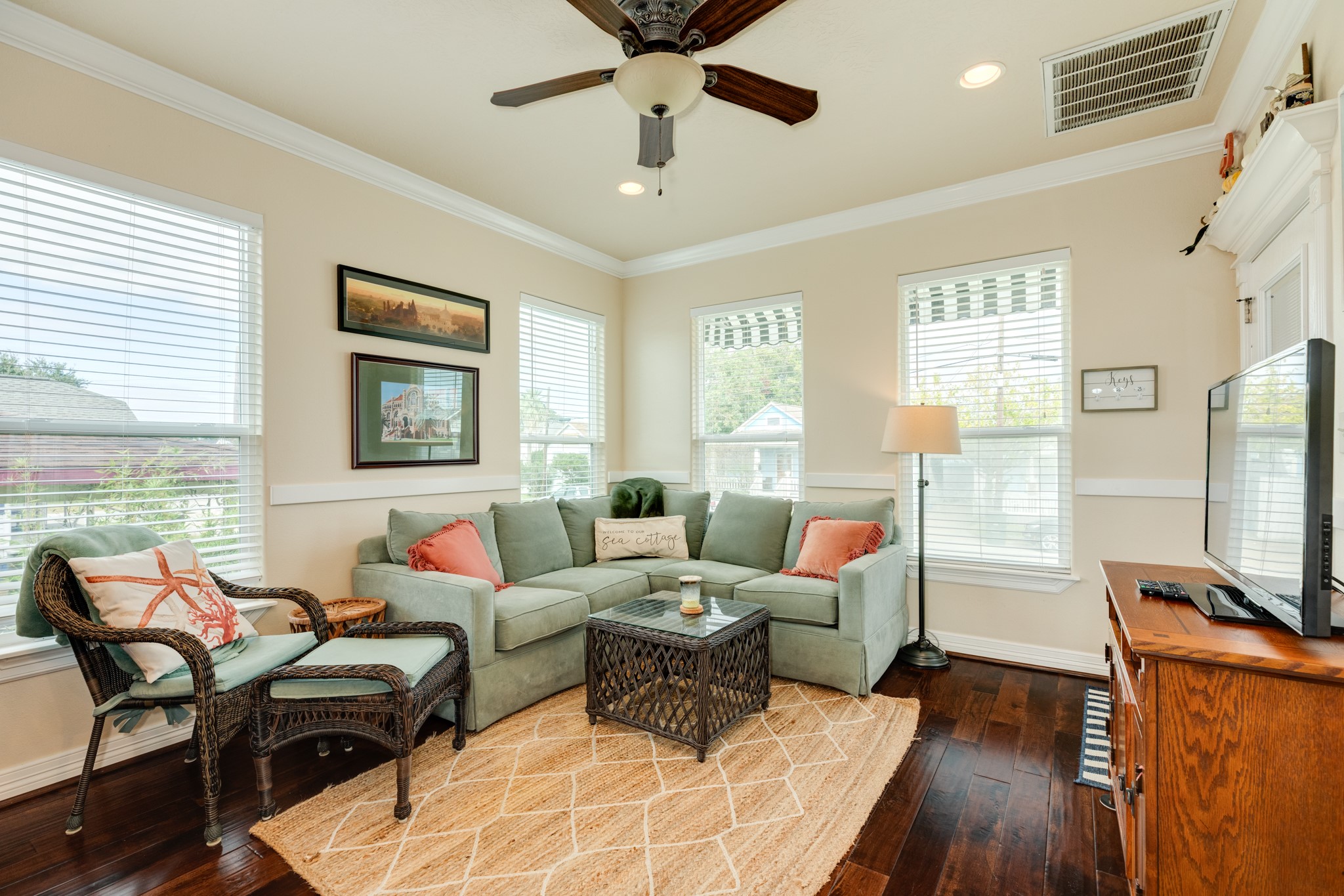 4317 Avenue R Galveston, TX 77550 - Photo 15 of 27 a living room with furniture a wooden floor and a window