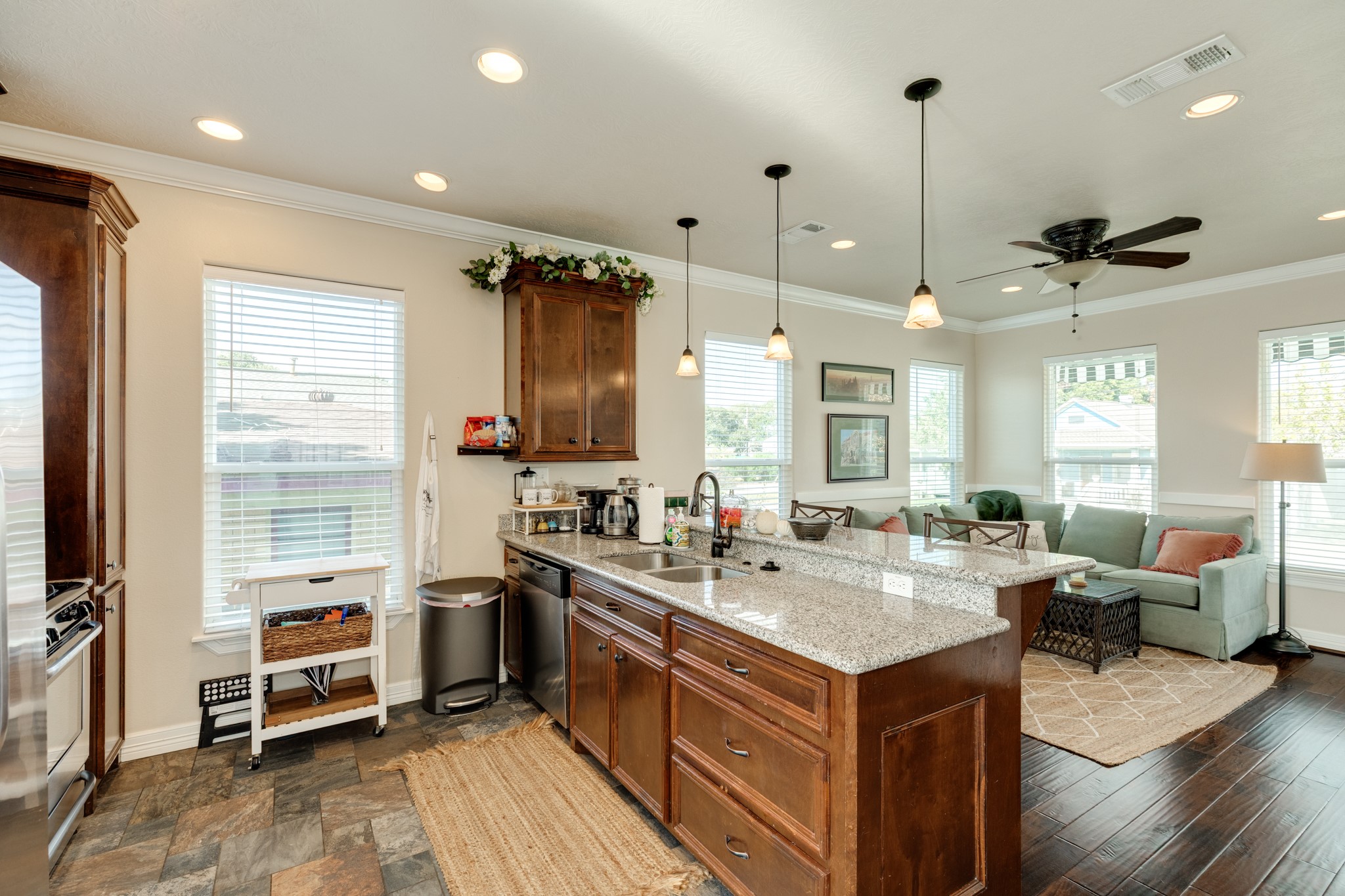 4317 Avenue R Galveston, TX 77550 - Photo 19 of 27 a kitchen with a stove and a refrigerator