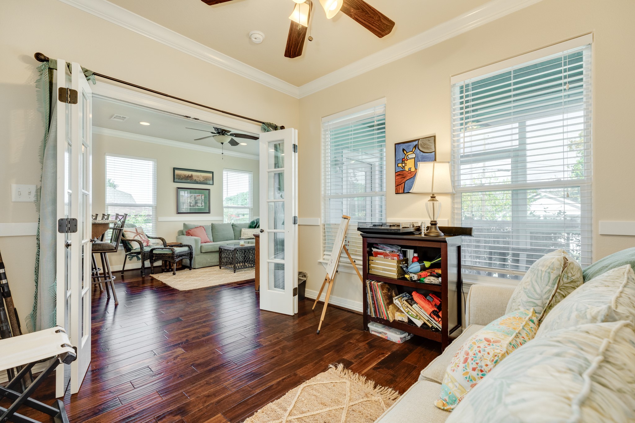 4317 Avenue R Galveston, TX 77550 - Photo 24 of 27 a living room with furniture and a wooden floor