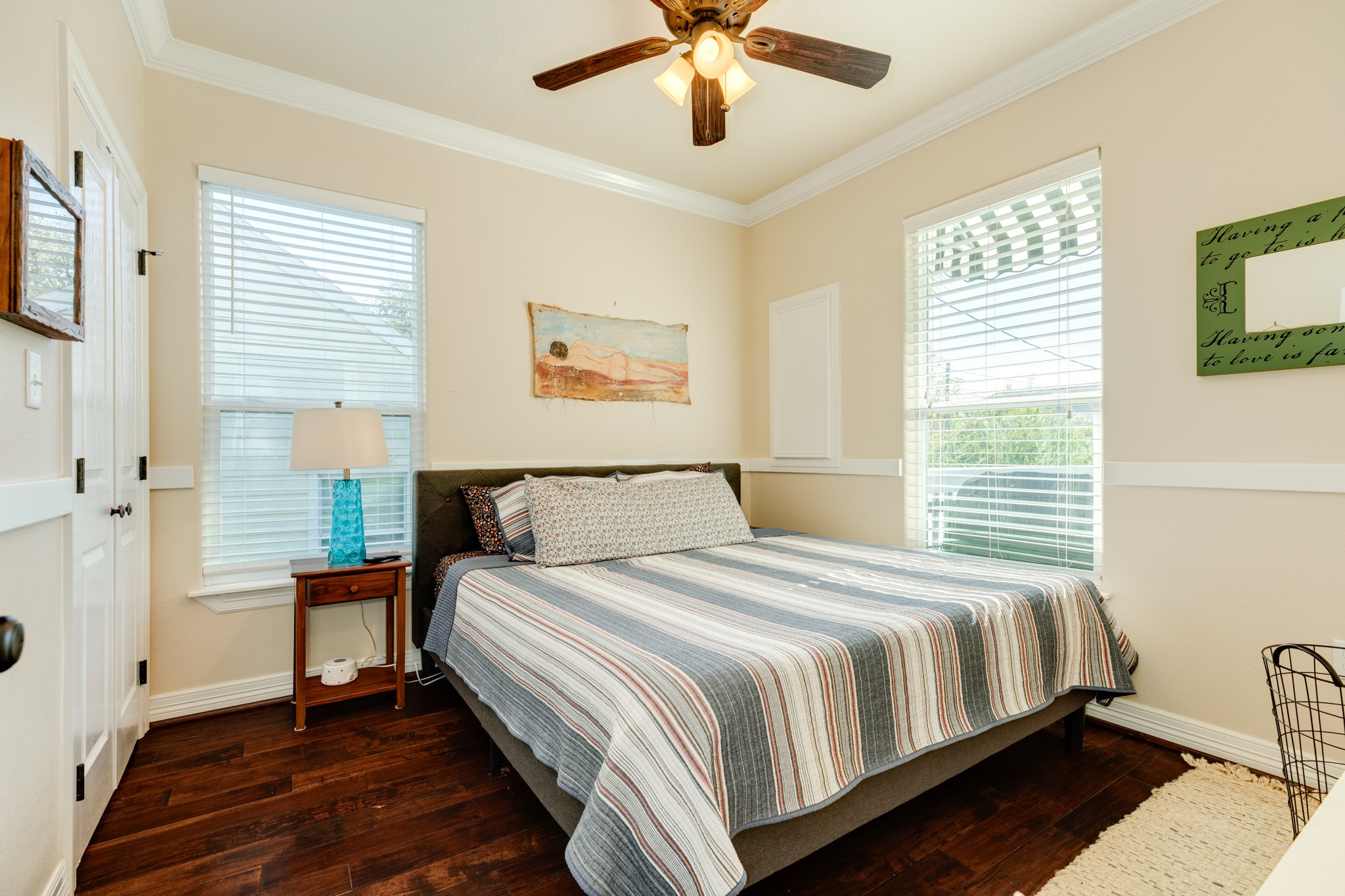 4317 Avenue R Galveston, TX 77550 - Photo 25 of 27 a bedroom with a bed and a window