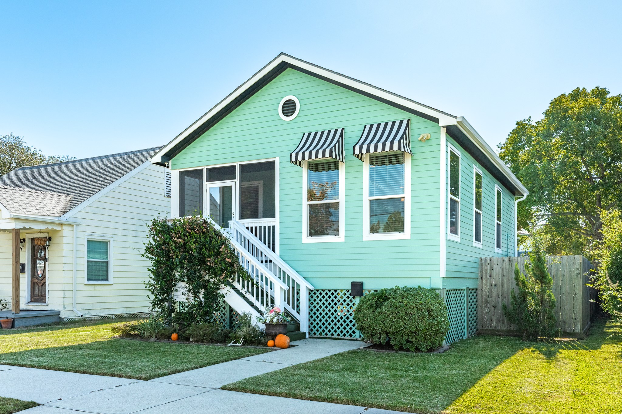 4317 Avenue R Galveston, TX 77550 - Photo 3 of 27 a front view of a house with garden