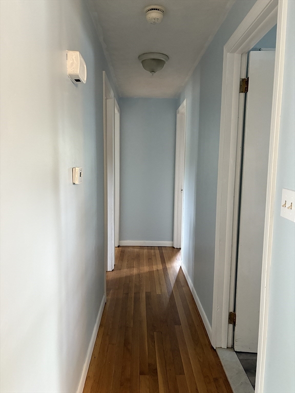 21 David Street Enfield, CT 06082 - Photo 10 of 21 a view of a hallway with wooden floor