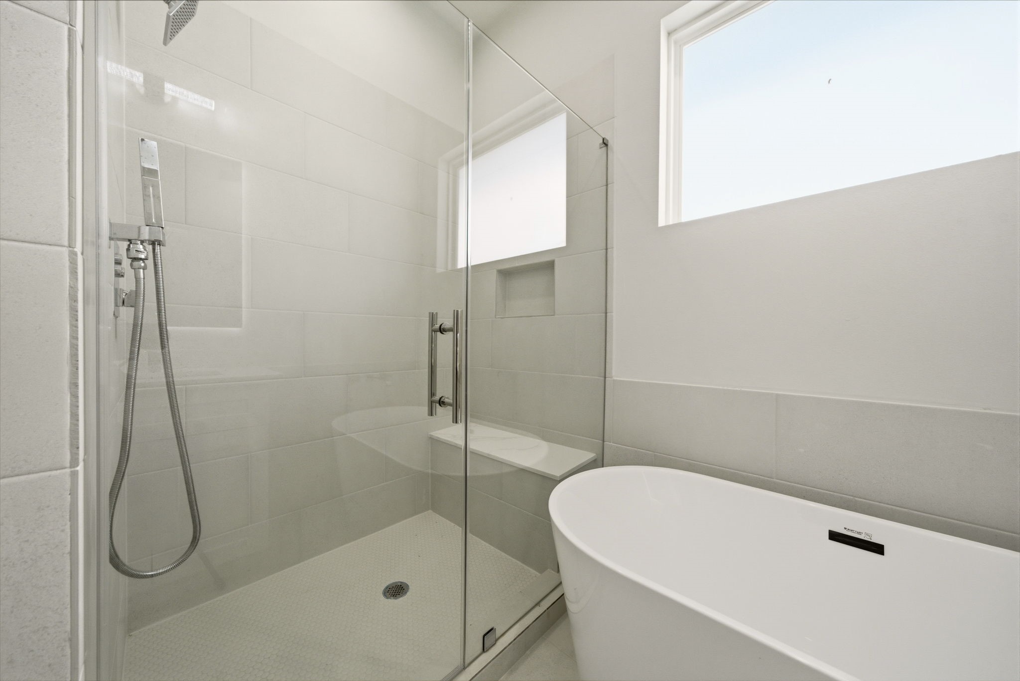 1398 Cedar Post Lane Houston, TX 77080 - Photo 21 of 33 a bathroom with a white bath tub and a shower