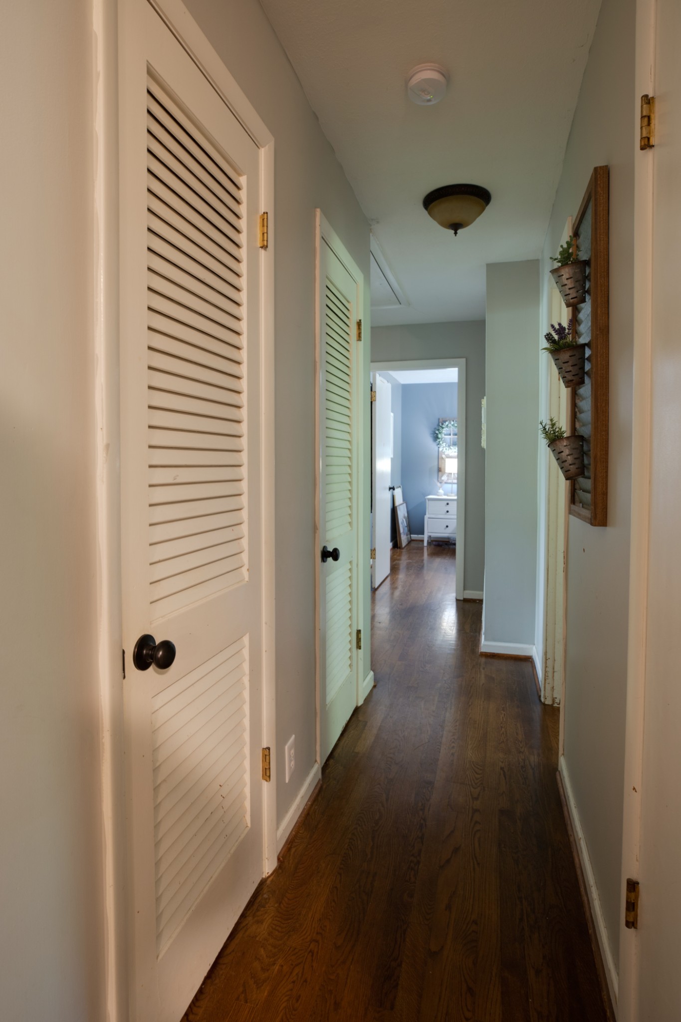 304 South Hummingbird Lane Dickson, TN 37055 - Photo 13 of 37 a view of a hallway with wooden floor and closet