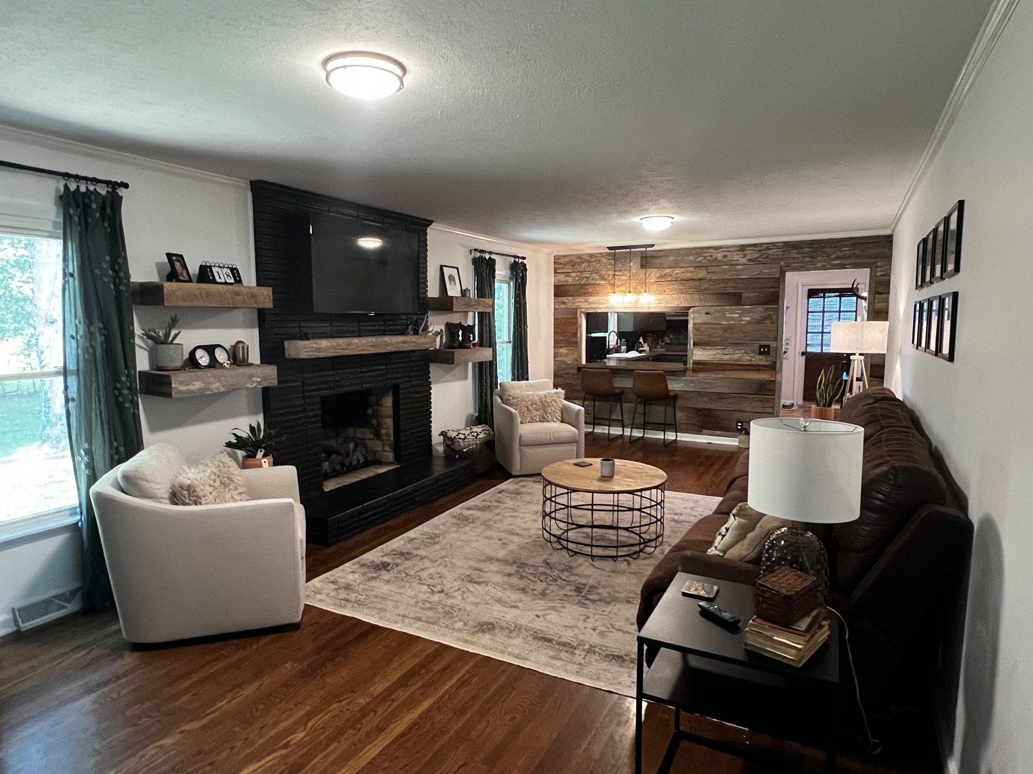 304 South Hummingbird Lane Dickson, TN 37055 - Photo 14 of 37 a living room with furniture and a fireplace