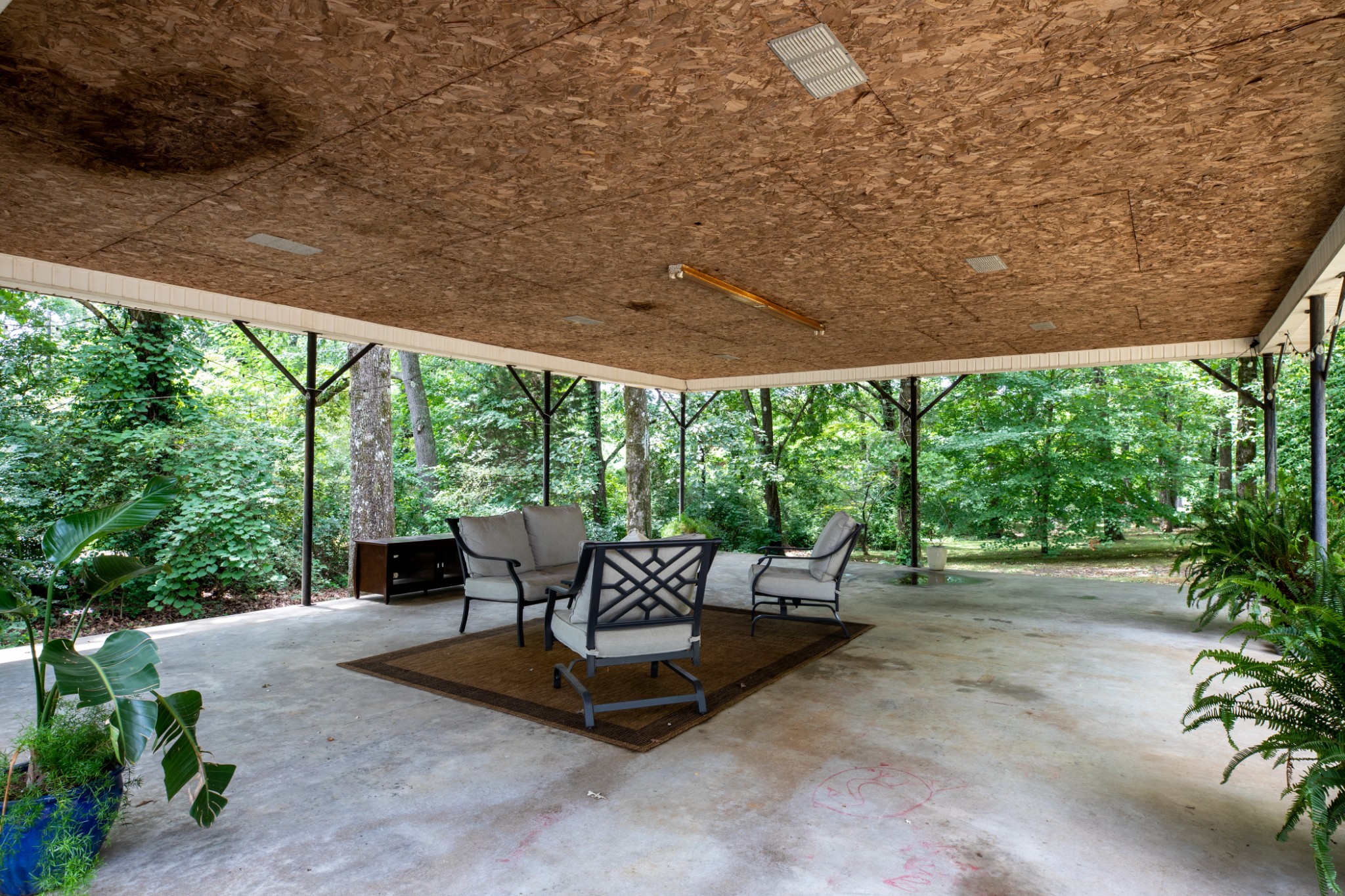 304 South Hummingbird Lane Dickson, TN 37055 - Photo 6 of 37 a view of a patio with a chairs and table in the patio