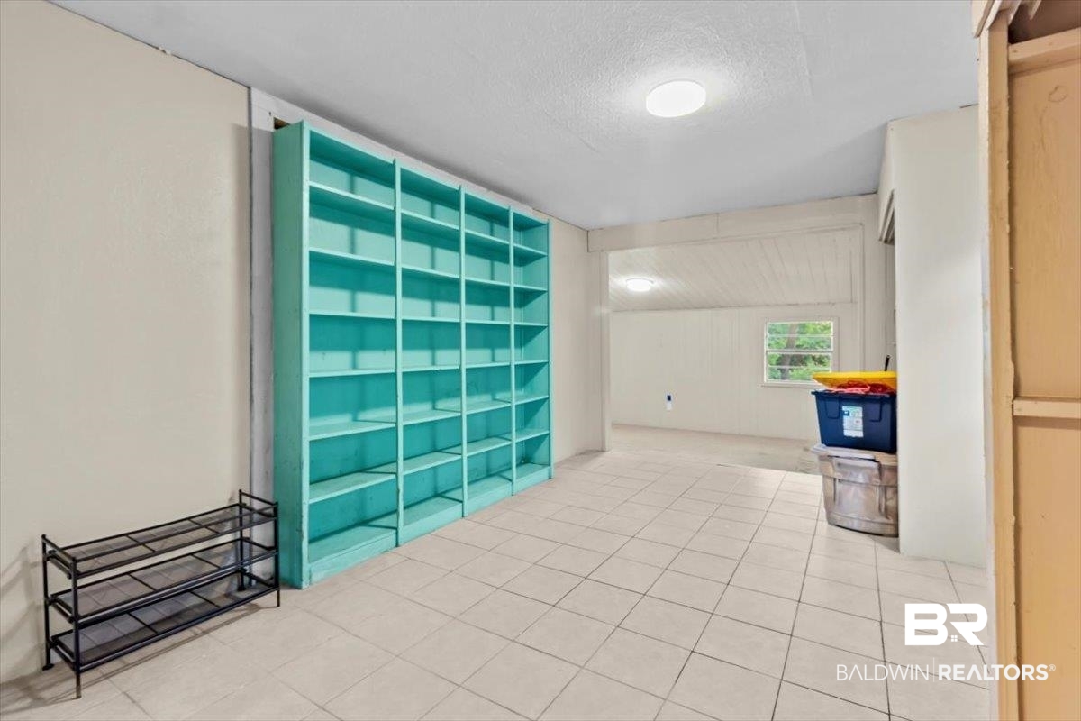 4918 Quimby Drive Mobile, AL 36619 - Photo 23 of 38 Empty room featuring a textured ceiling