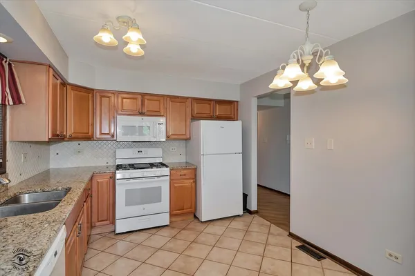 $229,000 | 15249 Catalina Drive, Unit 1N, Orland Park, IL 60462