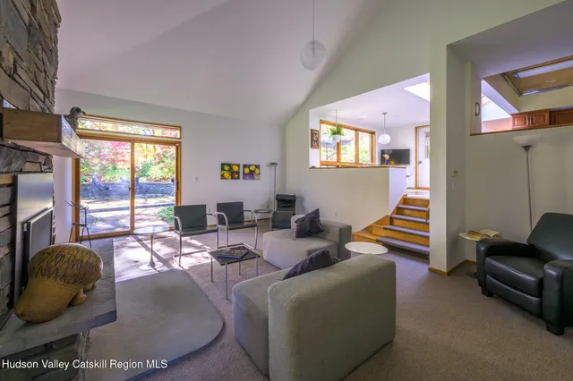 a view of a workspace with furniture