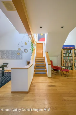 a house view with a sitting space and garden