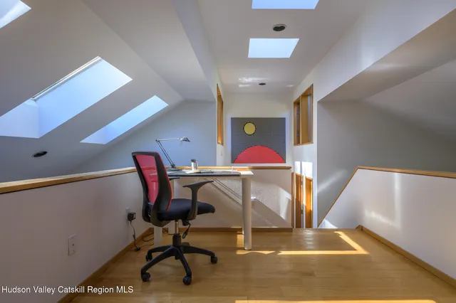 a view of a large tree with a yard