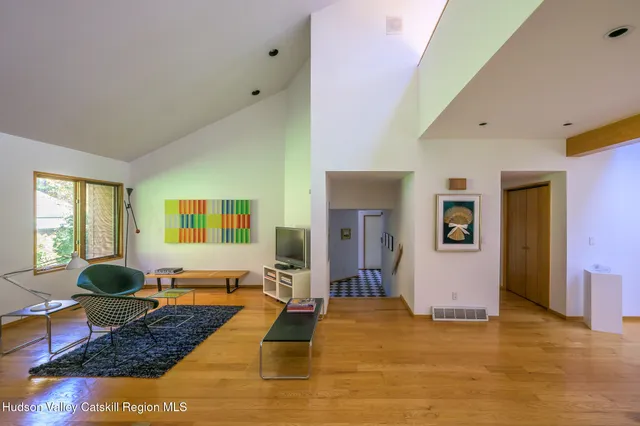 a view of swimming pool with seating area