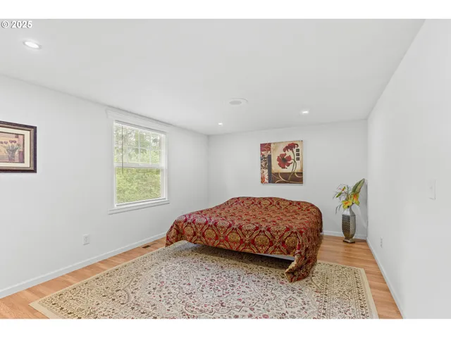 a view of living room with furniture and a dining room