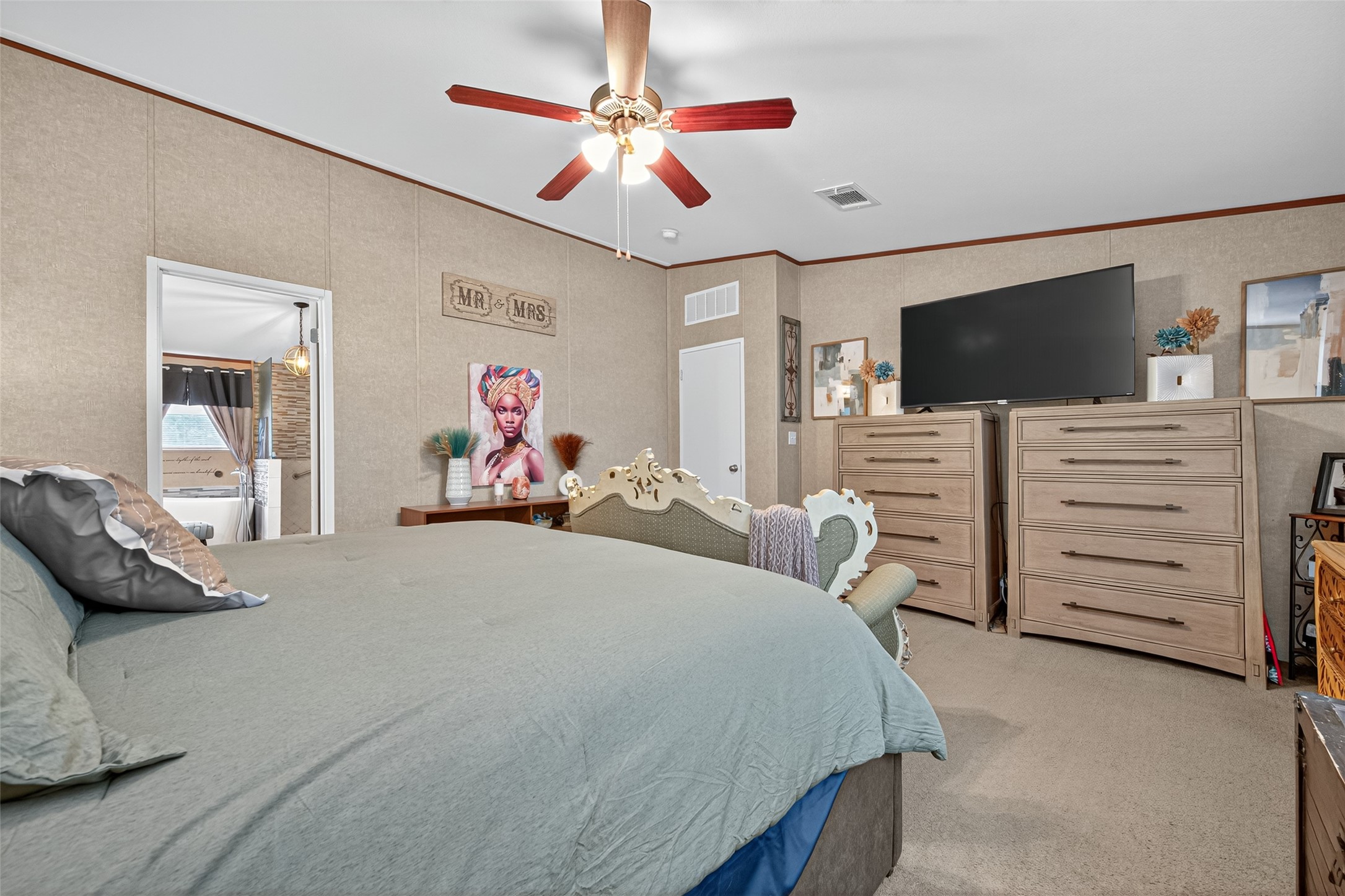 10715 Bozeman Ferry Road Midway, TX 75852 - Photo 20 of 50 a bedroom with furniture and a flat screen tv