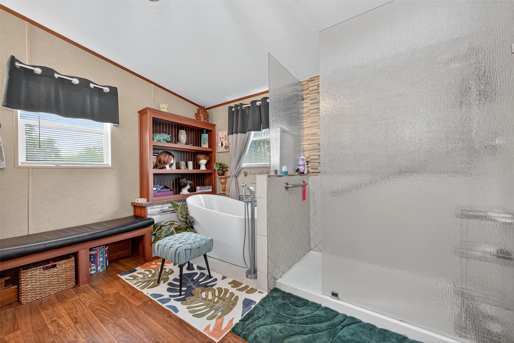 10715 Bozeman Ferry Road Midway, TX 75852 - Photo 23 of 50 a living room with a couch and a book shelf