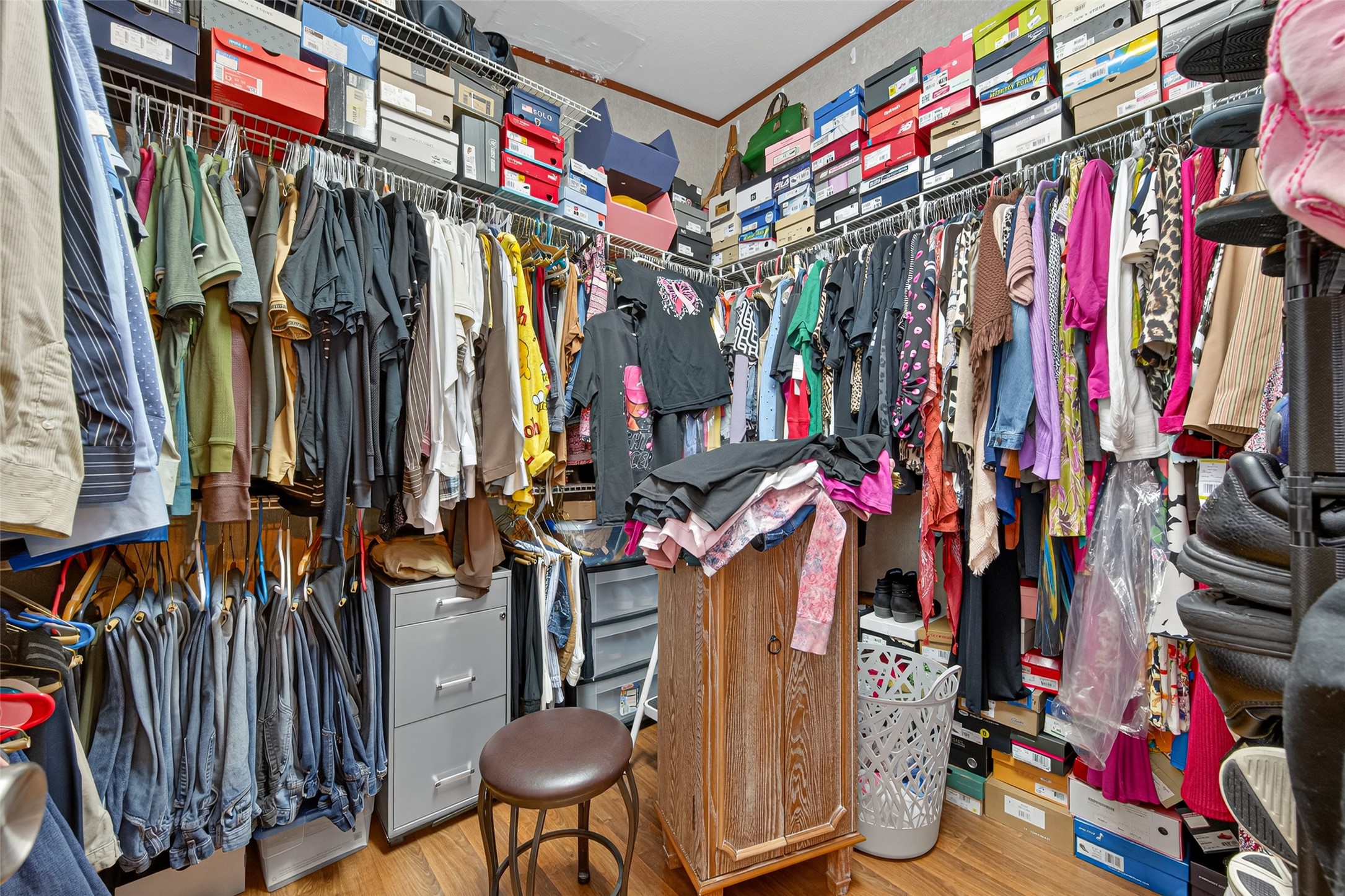 10715 Bozeman Ferry Road Midway, TX 75852 - Photo 27 of 50 a view of walk in closet with clothes