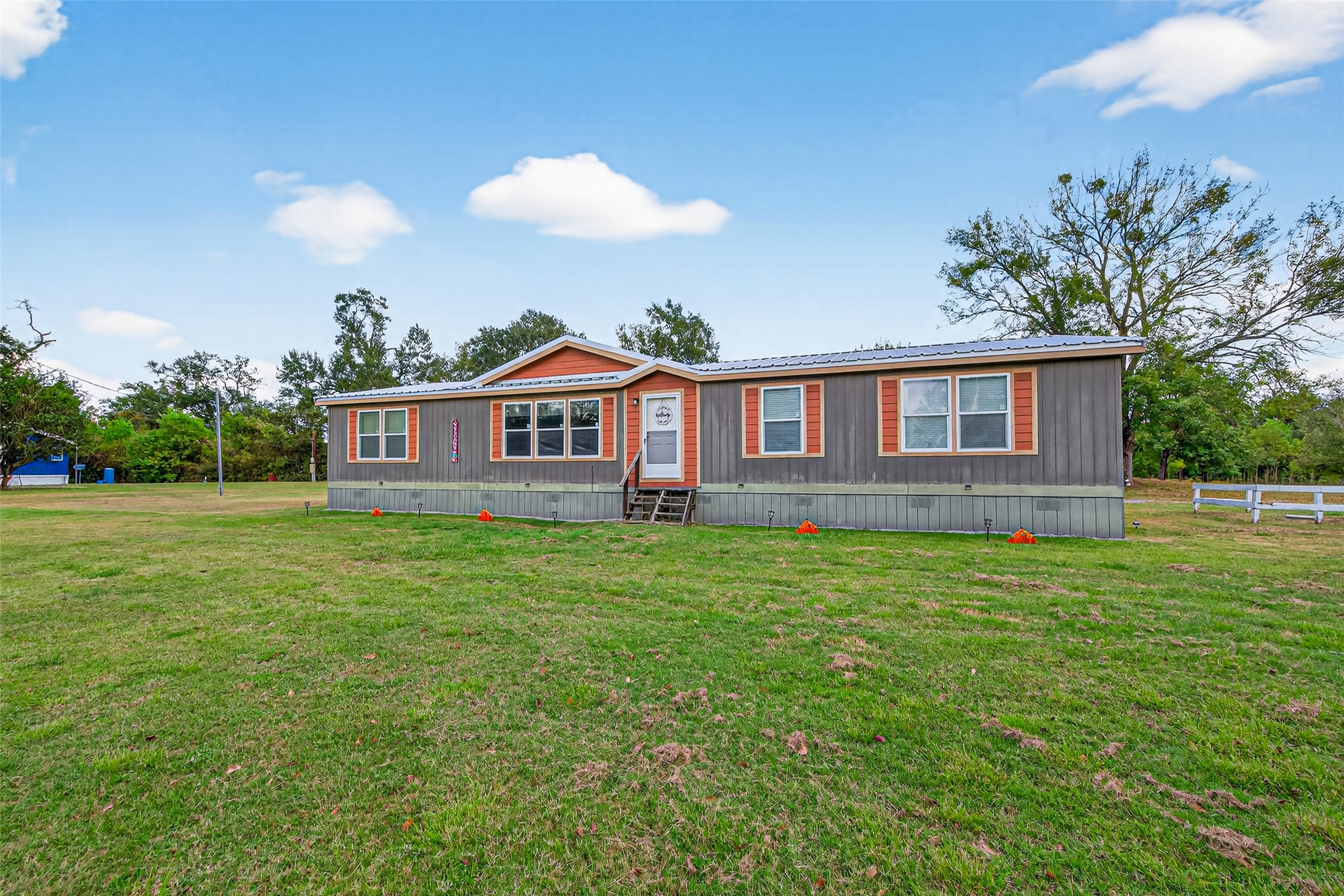10715 Bozeman Ferry Road Midway, TX 75852 - Photo 3 of 50 a view of a house with a backyard