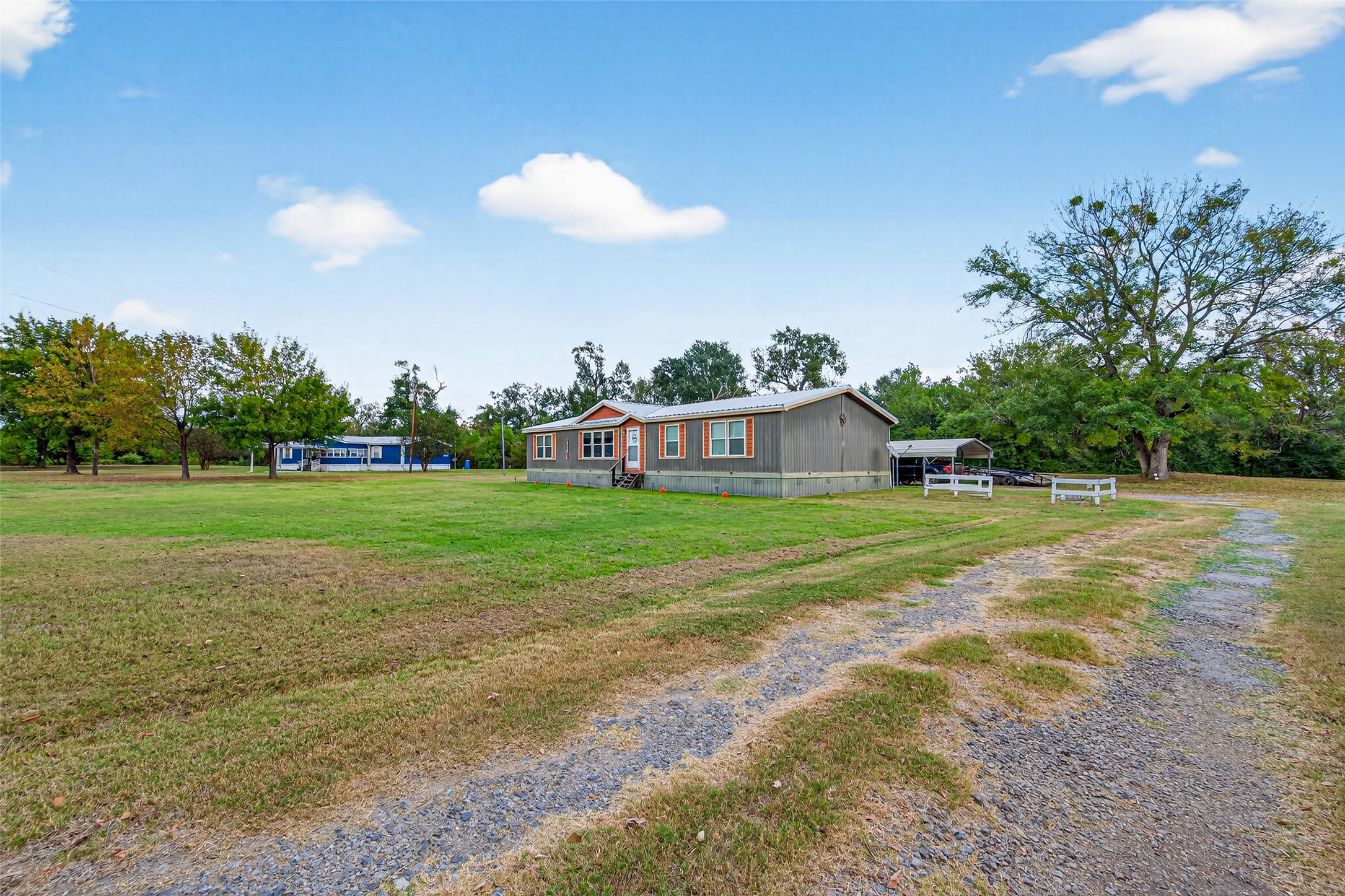 10715 Bozeman Ferry Road Midway, TX 75852 - Photo 40 of 50 a view of a house with a big yard