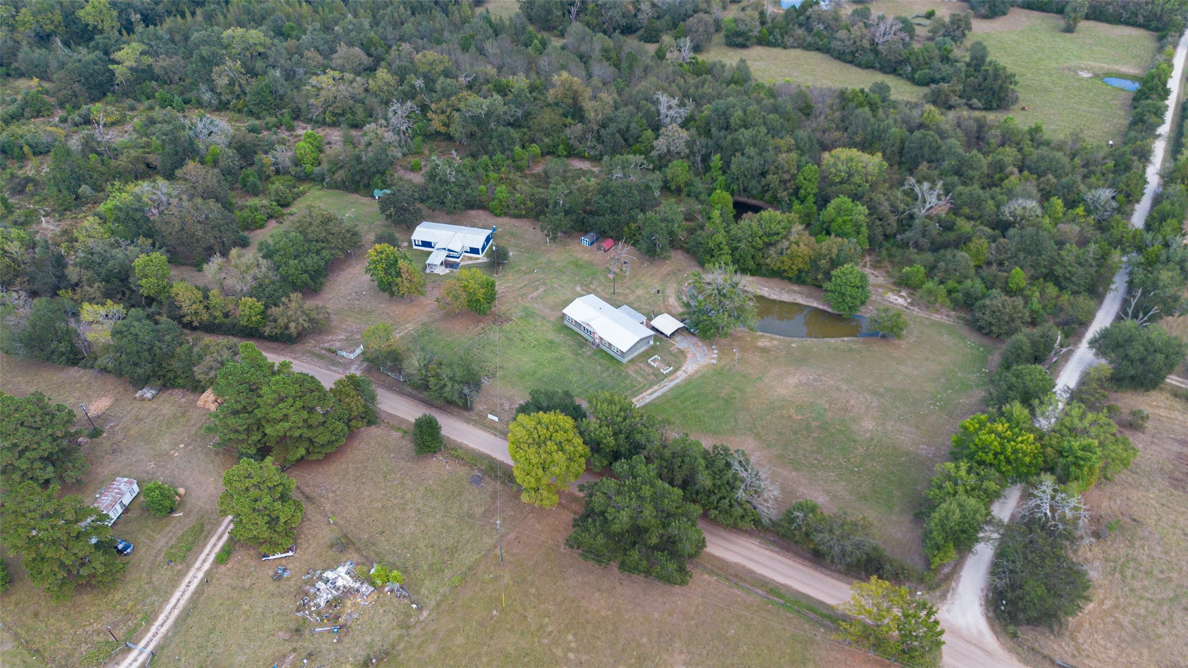 10715 Bozeman Ferry Road Midway, TX 75852 - Photo 4 of 50 an aerial view of a house with a yard