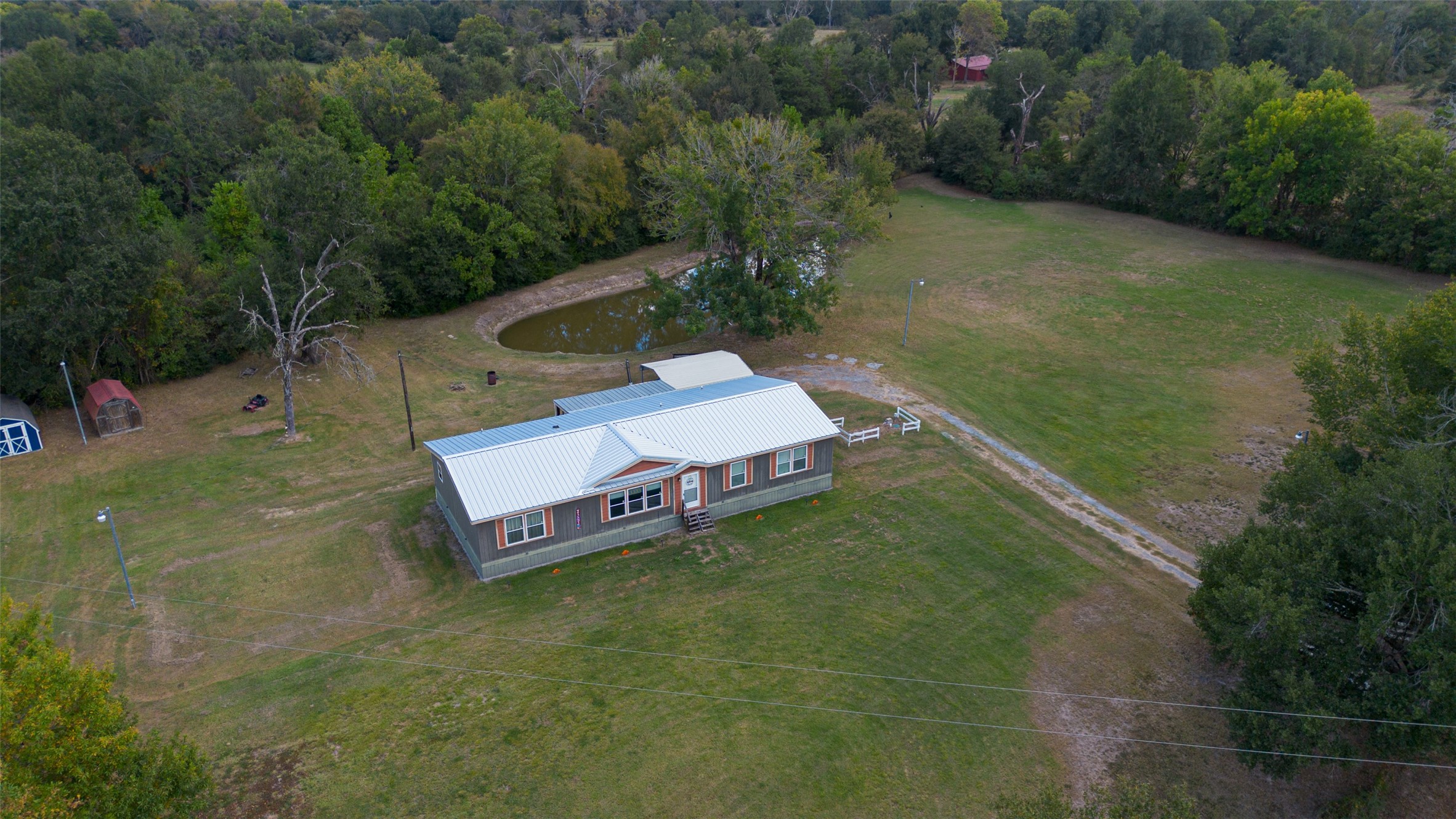 10715 Bozeman Ferry Road Midway, TX 75852 - Photo 45 of 50 an aerial view of a house