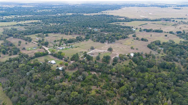 an aerial view of mountains and trees
