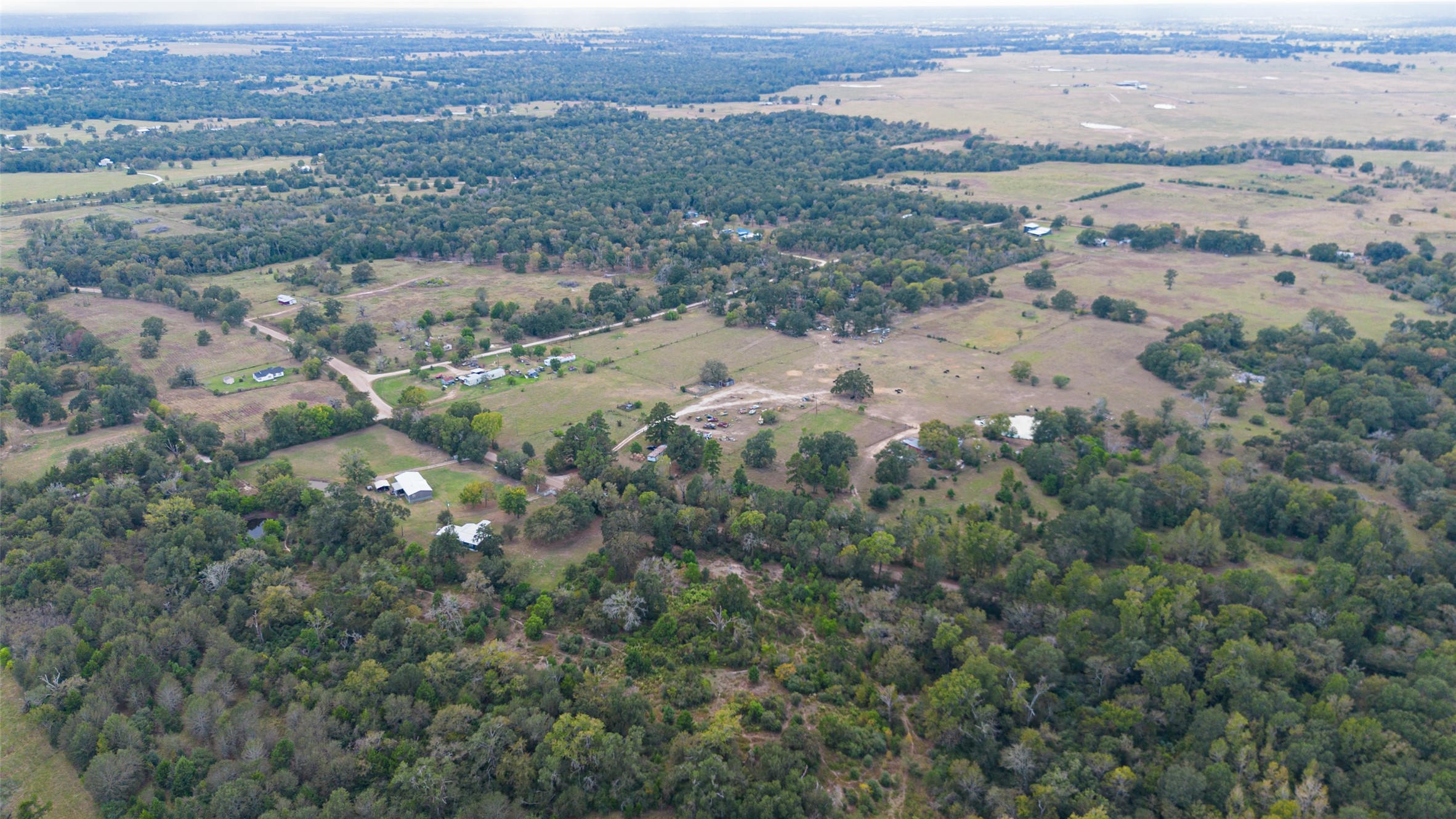 10715 Bozeman Ferry Road Midway, TX 75852 - Photo 50 of 50 an aerial view of mountains and trees