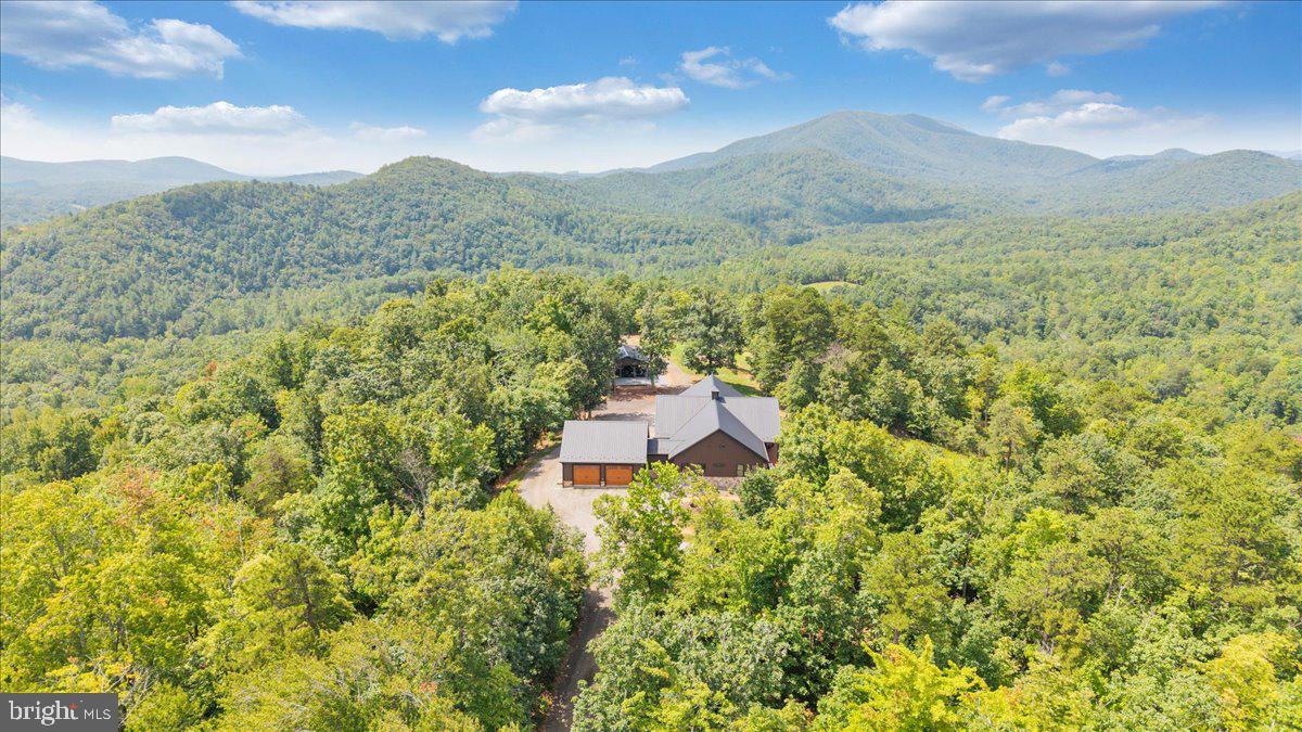 415 Grahams Farm Road Stuart, VA 24171 - Photo 9 of 121 Secluded retreat amidst lush mountains.