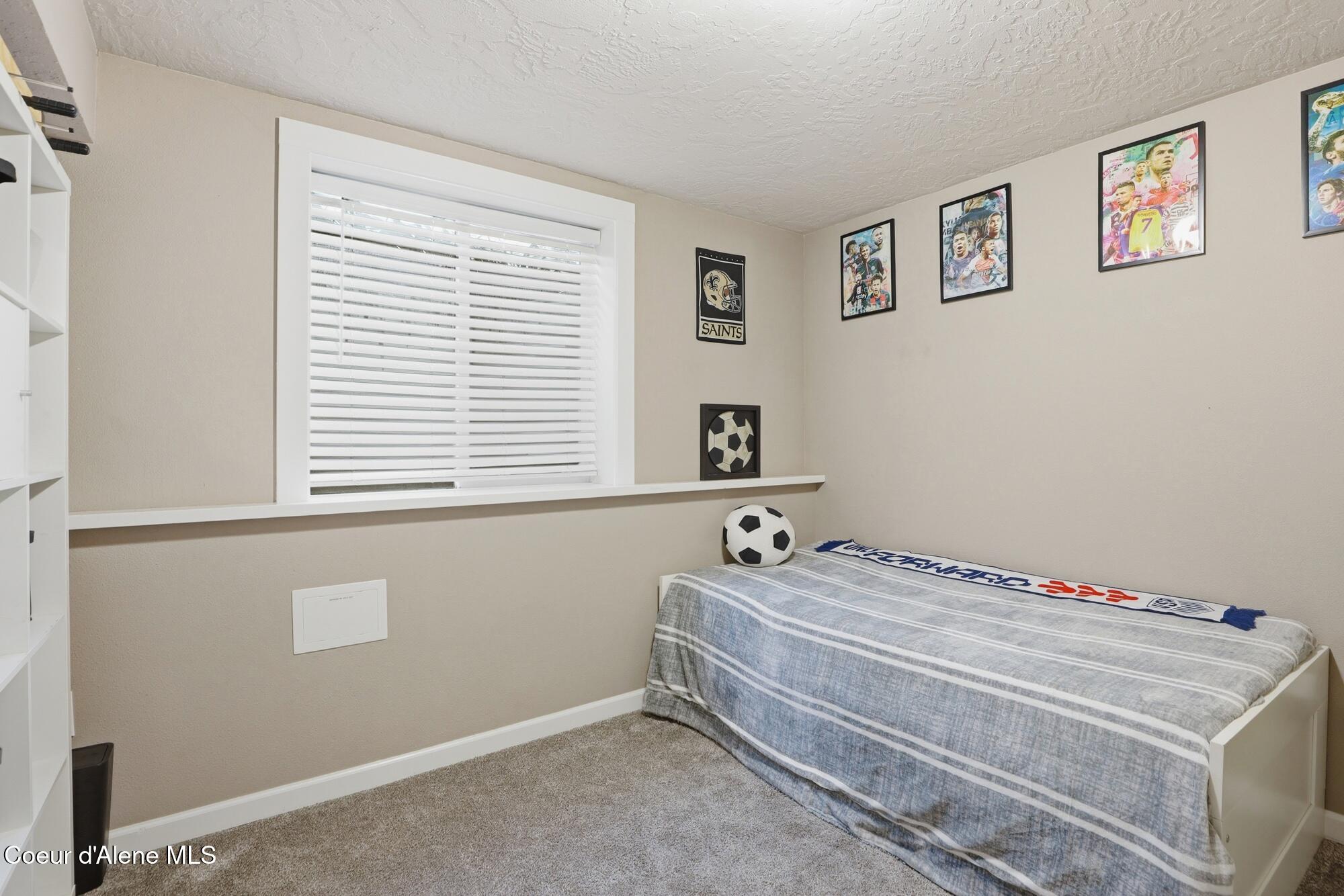 15720 North Ridgeway Drive Hayden, ID 83835 - Photo 27 of 40 Basement Bedroom