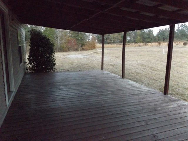 504 White Pond Road Williston, SC 29853 - Photo 14 of 15 a view of a glass door with an outdoor space