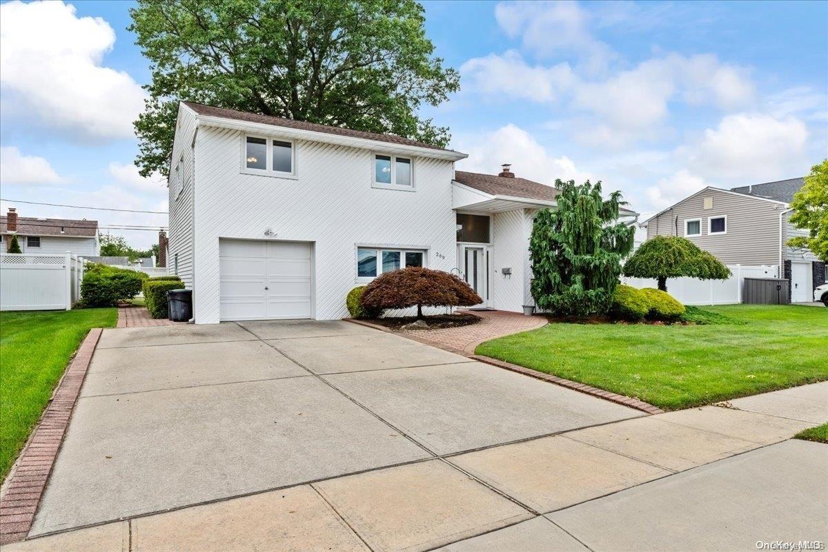 a house view with a garden space