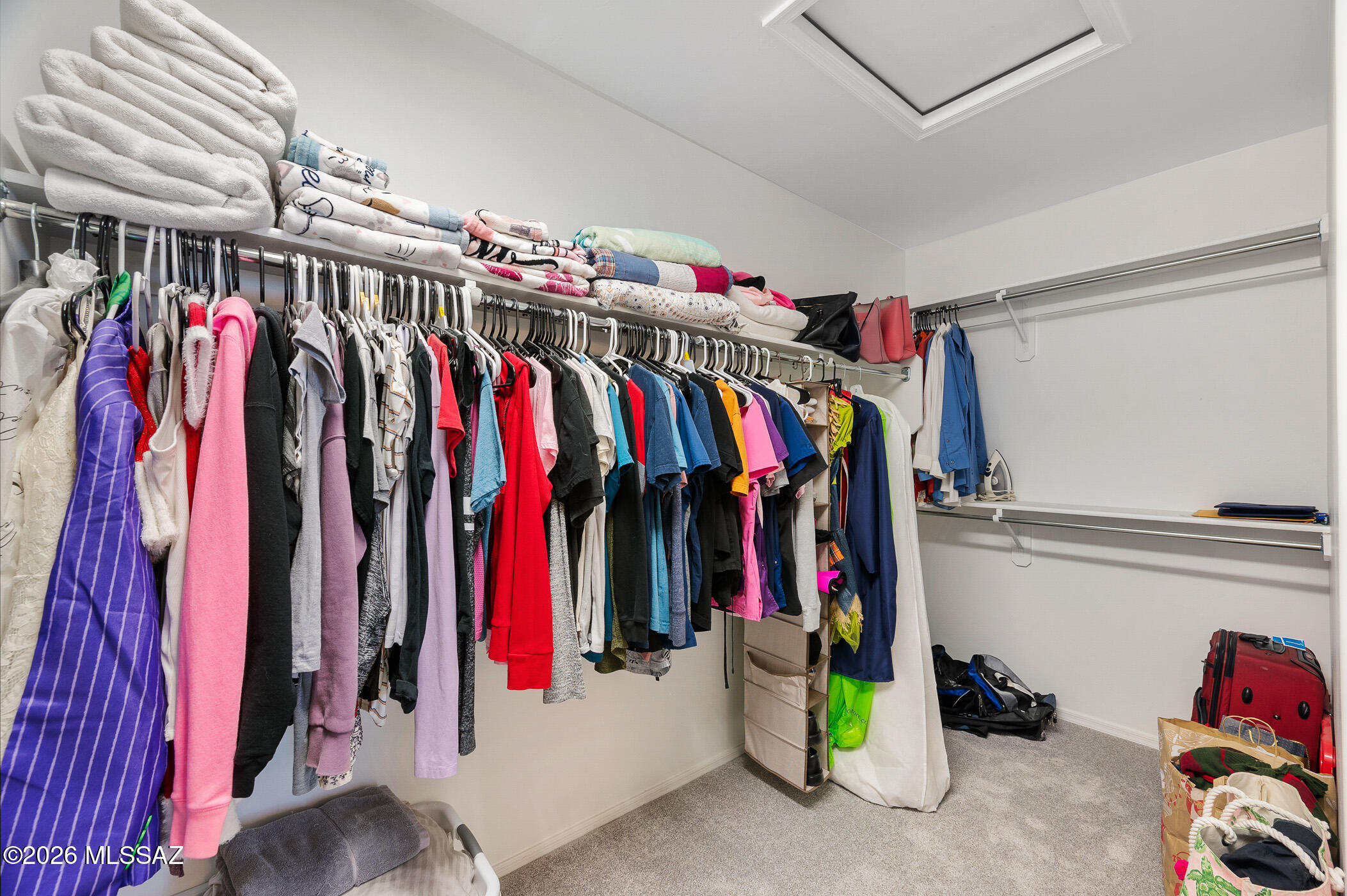 12092 East Ryscott Circle Vail, AZ 85641 - Photo 35 of 49 a view of walk in closet with clothes