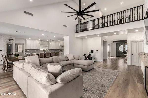a kitchen with cabinets and steel stainless steel appliances