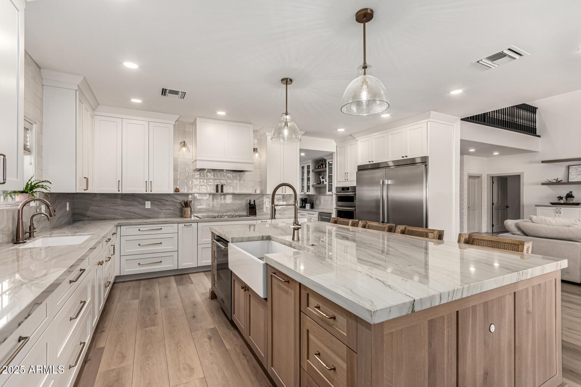 2552 East Ridgewood Lane Gilbert, AZ 85298 - Photo 20 of 80 a kitchen with stainless steel appliances granite countertop a sink refrigerator and cabinets