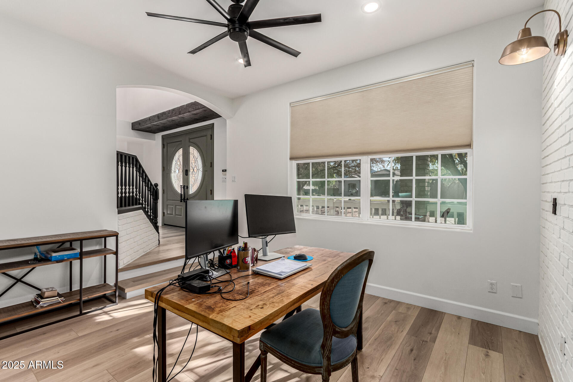 2552 East Ridgewood Lane Gilbert, AZ 85298 - Photo 31 of 80 a view of a workspace with furniture and a window
