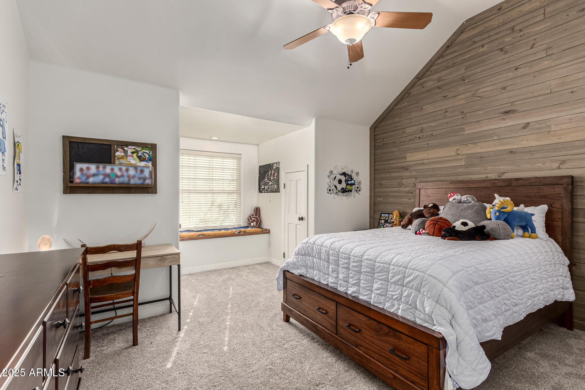 2552 East Ridgewood Lane Gilbert, AZ 85298 - Photo 40 of 80 a bedroom with a bed and a chandelier