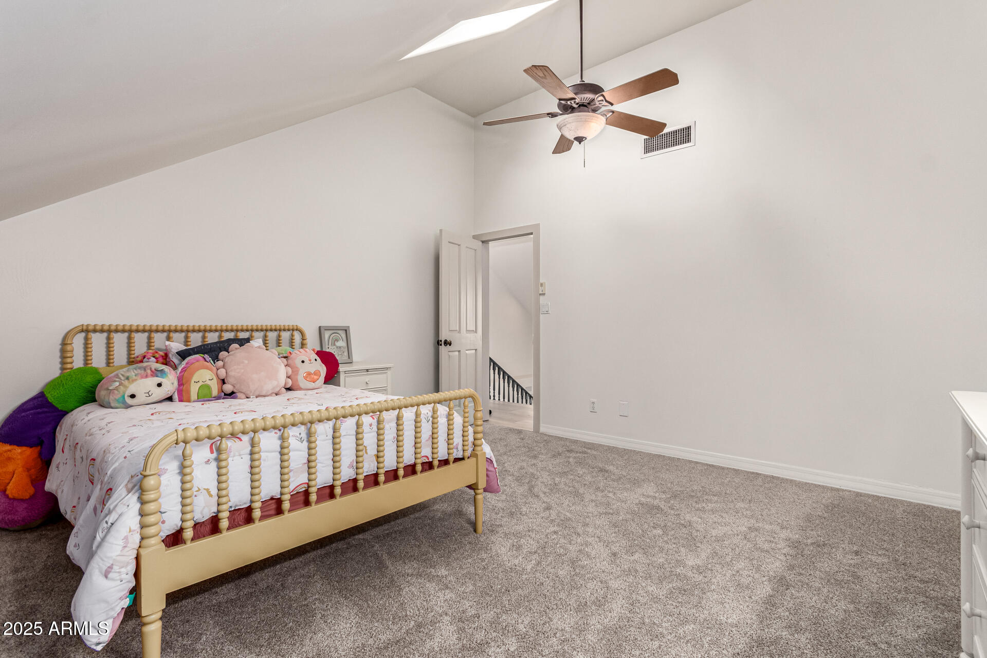 2552 East Ridgewood Lane Gilbert, AZ 85298 - Photo 44 of 80 a bedroom with a bed and a ceiling fan