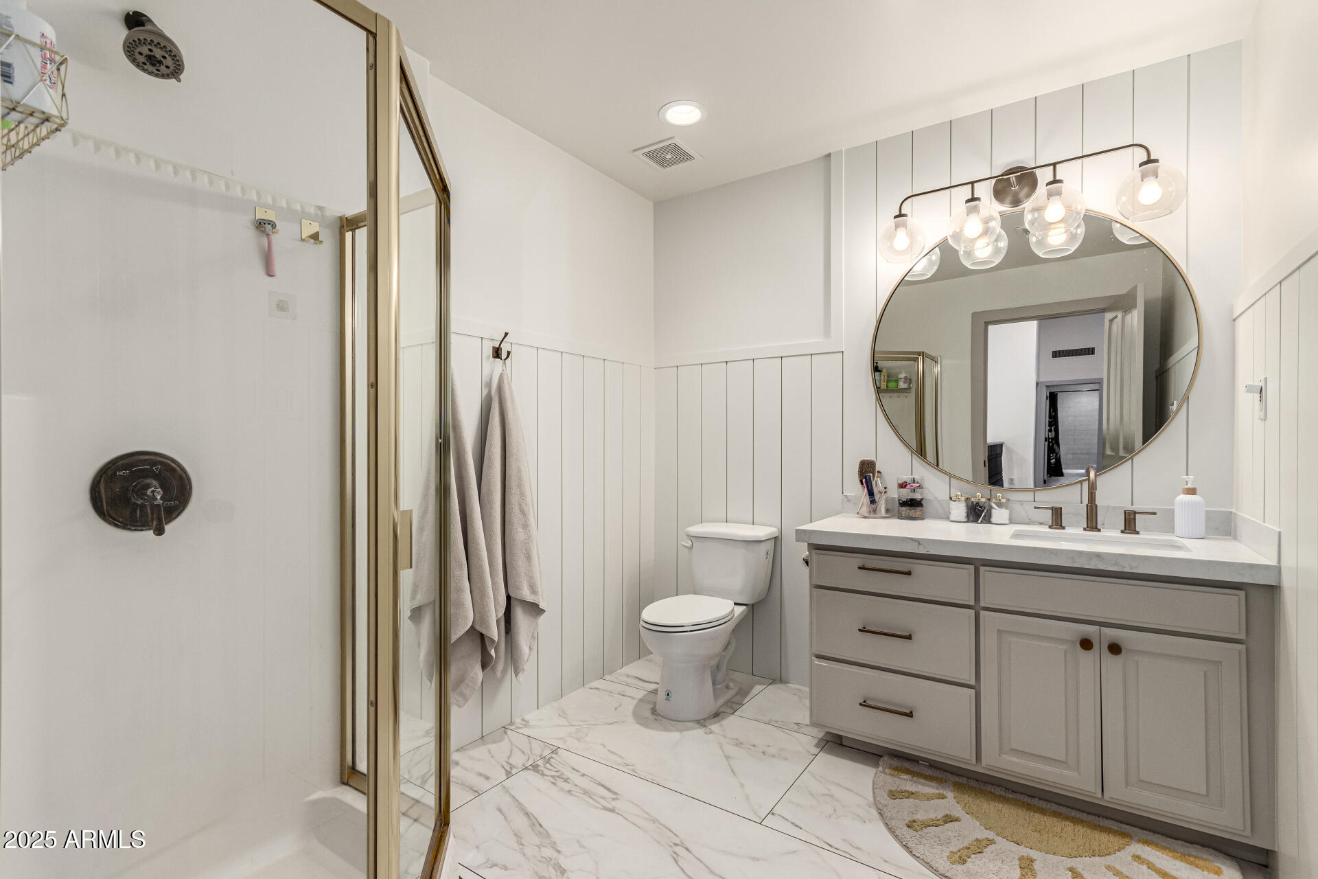2552 East Ridgewood Lane Gilbert, AZ 85298 - Photo 45 of 80 a bathroom with a double vanity sink mirror and toilet