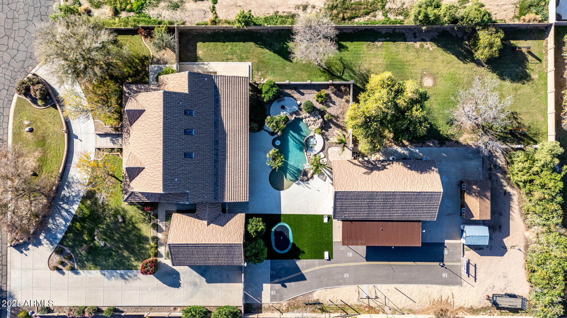 2552 East Ridgewood Lane Gilbert, AZ 85298 - Photo 5 of 80 an aerial view of house with yard swimming pool and outdoor seating