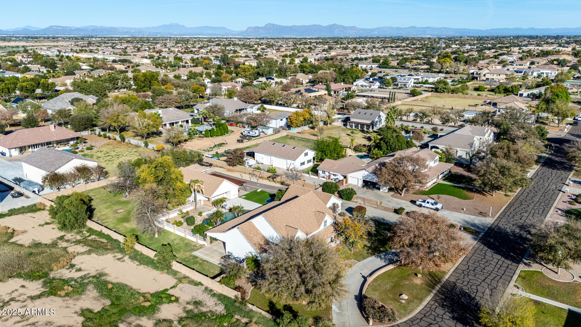2552 East Ridgewood Lane Gilbert, AZ 85298 - Photo 68 of 80 an aerial view of a house with a yard